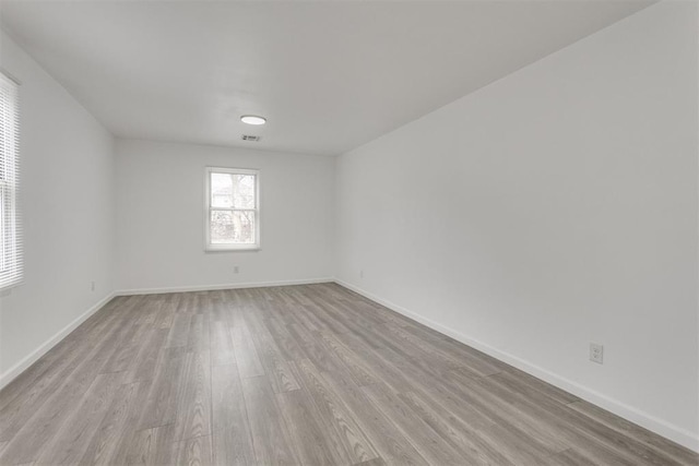 1617 NW 31st St, Oklahoma City, OK 73118 - spare room featuring light wood-style flooring and baseboards