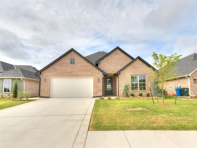 208 Pont Neuf Ct, Edmond, OK 73034 - view of front of property featuring brick siding, a garage, concrete driveway, and a front yard