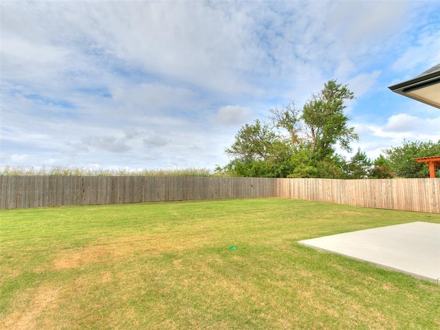 208 Pont Neuf Ct, Edmond, OK 73034 - fenced backyard with a patio