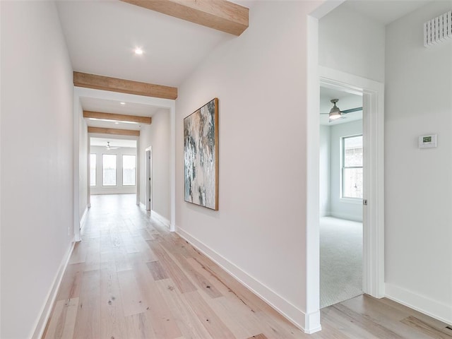 208 Pont Neuf Ct, Edmond, OK 73034 - hall featuring plenty of natural light, beam ceiling, light wood-style flooring, and recessed lighting