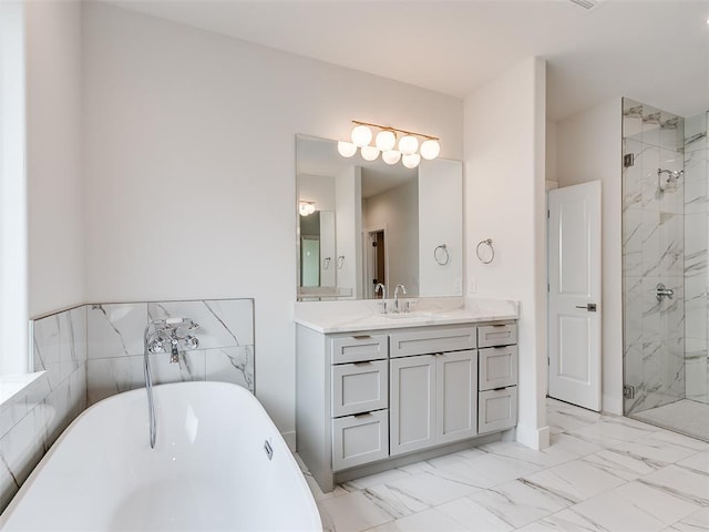 208 Pont Neuf Ct, Edmond, OK 73034 - full bath with a freestanding tub, marble look tiles, a marble finish shower, and vanity