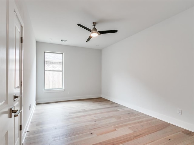 208 Pont Neuf Ct, Edmond, OK 73034 - empty room featuring light wood-type flooring and a ceiling fan