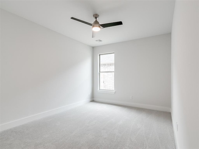 208 Pont Neuf Ct, Edmond, OK 73034 - empty room featuring ceiling fan and light carpet