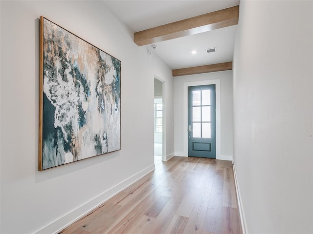 208 Pont Neuf Ct, Edmond, OK 73034 - entrance foyer featuring beam ceiling and light wood-style flooring