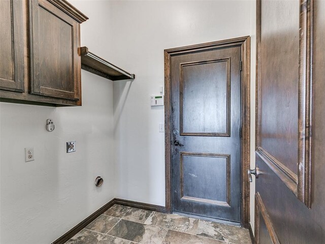 3205 NW 192nd Ter, Edmond, OK 73012 - washroom with hookup for a washing machine and cabinet space