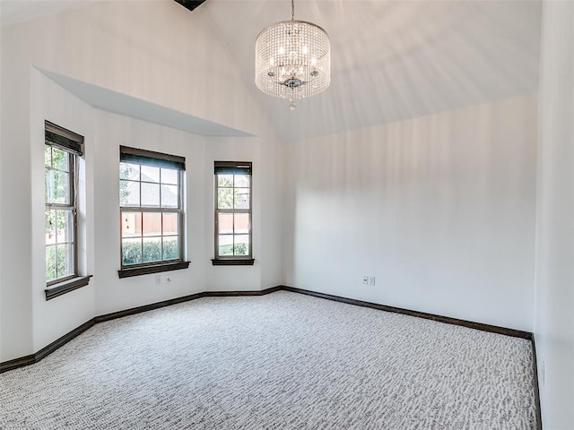 3205 NW 192nd Ter, Edmond, OK 73012 - carpeted empty room featuring a chandelier and high vaulted ceiling