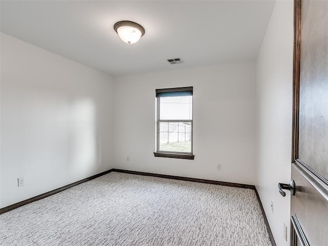 3205 NW 192nd Ter, Edmond, OK 73012 - spare room with carpet and baseboards