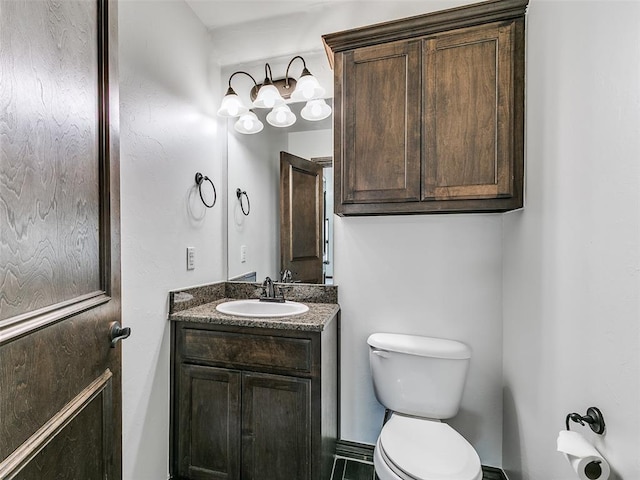3205 NW 192nd Ter, Edmond, OK 73012 - bathroom featuring toilet and vanity