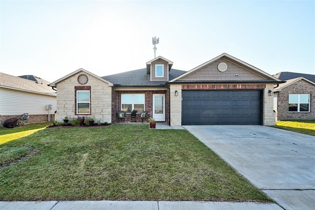 1621 Tumbleweed Way, El Reno, OK 73036 - ranch-style house featuring a garage, a front yard, concrete driveway, stone siding, and brick siding