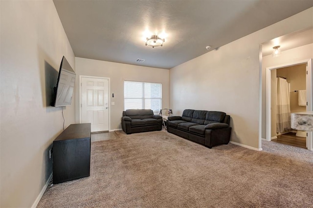 1621 Tumbleweed Way, El Reno, OK 73036 - living area with carpet floors and baseboards