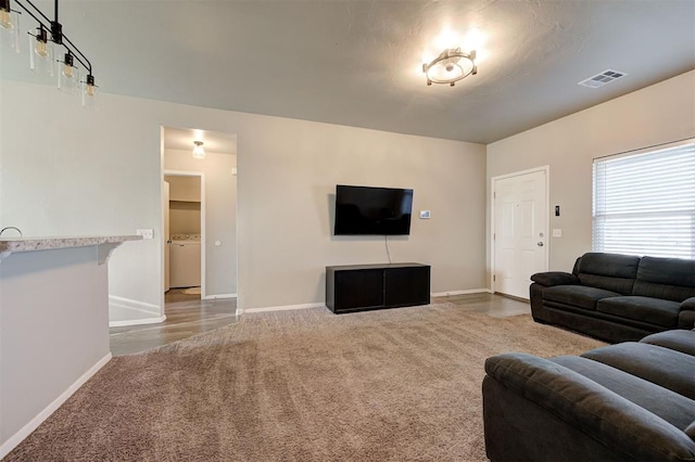 1621 Tumbleweed Way, El Reno, OK 73036 - living room with carpet and washer / dryer