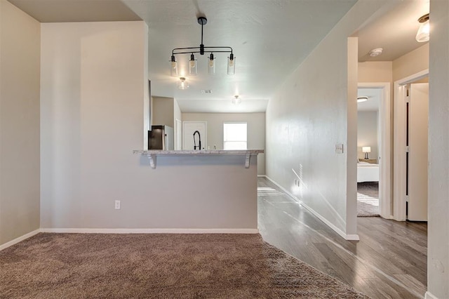 1621 Tumbleweed Way, El Reno, OK 73036 - unfurnished room with a smoke detector and wood finished floors