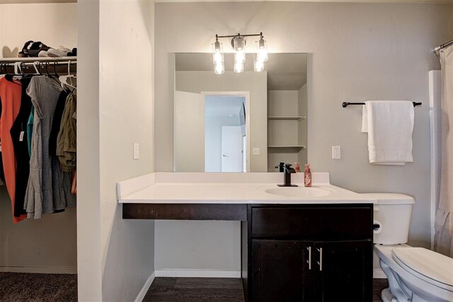1621 Tumbleweed Way, El Reno, OK 73036 - bathroom with vanity, a walk in closet, and curtained shower