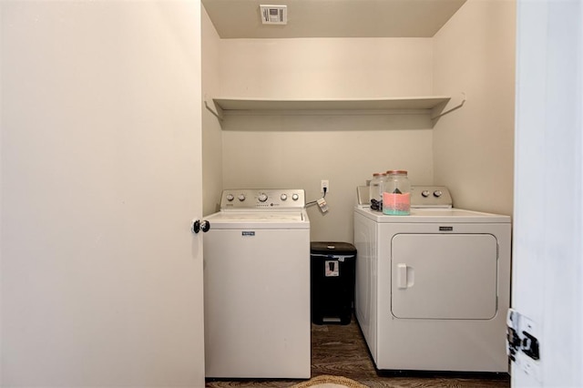 1621 Tumbleweed Way, El Reno, OK 73036 - washroom with washer and clothes dryer and wood finished floors