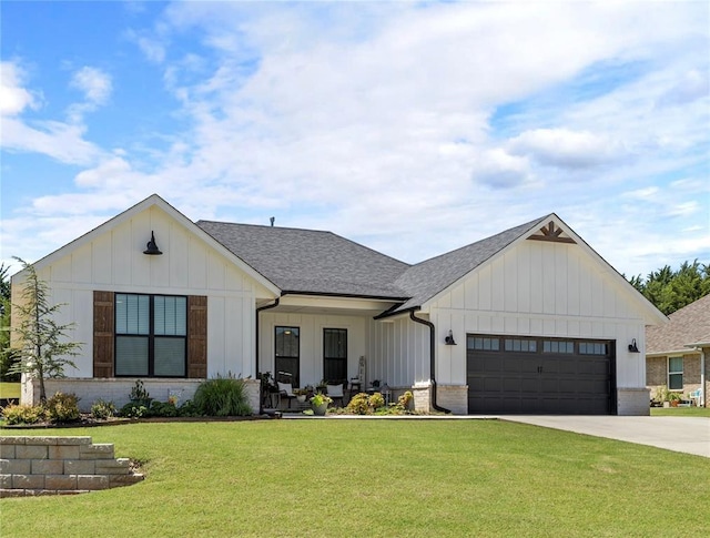 2666 Legacy Pl, Shawnee, OK 74804 - modern inspired farmhouse with a garage, driveway, board and batten siding, and a front lawn