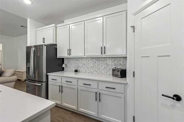 2666 Legacy Pl, Shawnee, OK 74804 - kitchen featuring stainless steel refrigerator with ice dispenser, light countertops, and tasteful backsplash