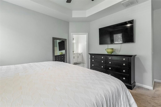2666 Legacy Pl, Shawnee, OK 74804 - carpeted bedroom with ensuite bath and ceiling fan