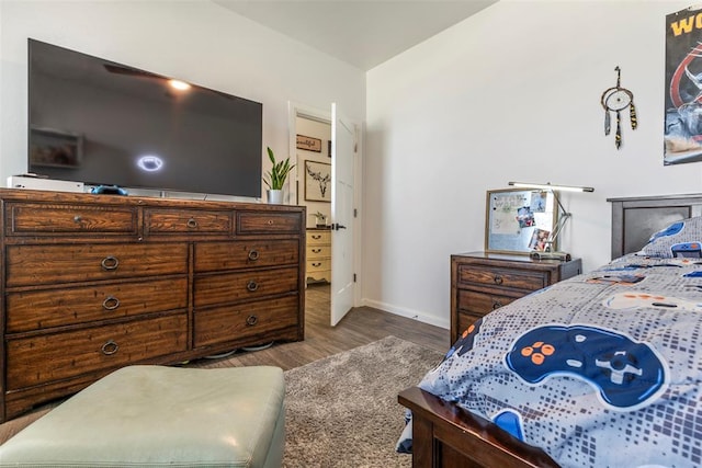 2666 Legacy Pl, Shawnee, OK 74804 - bedroom with wood finished floors and baseboards