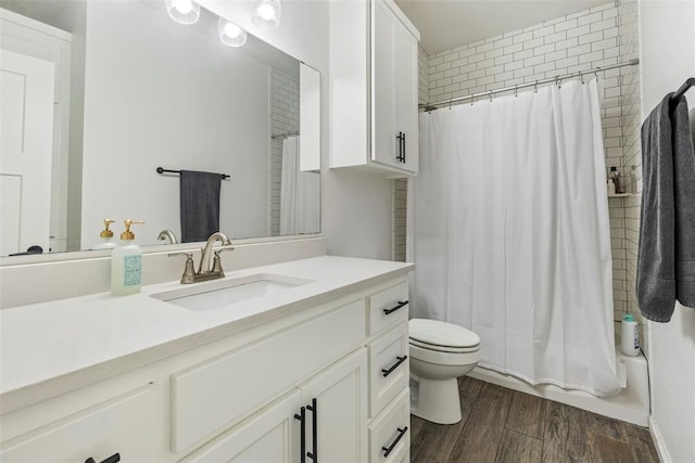 2666 Legacy Pl, Shawnee, OK 74804 - bathroom featuring vanity, wood finished floors, and shower / tub combo with curtain
