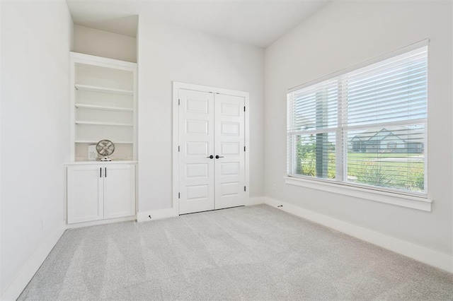 2316 Dixie Dr, Blanchard, OK 73010 - unfurnished bedroom featuring light colored carpet and a closet