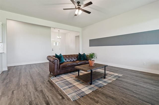 2316 Dixie Dr, Blanchard, OK 73010 - living room with wood finished floors, ceiling fan, and a chandelier