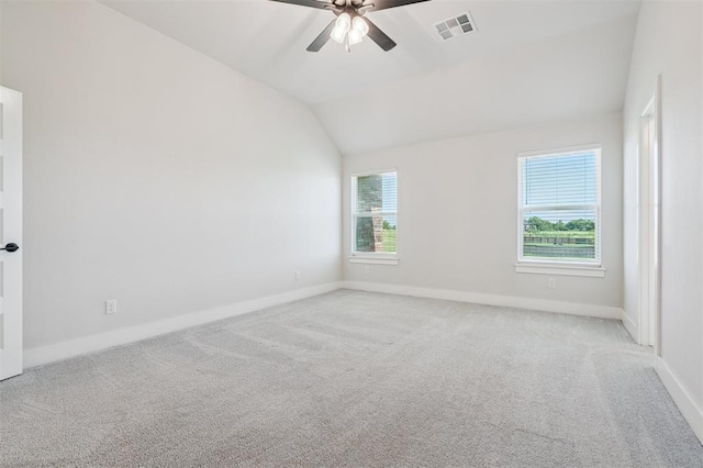 2316 Dixie Dr, Blanchard, OK 73010 - carpeted spare room with vaulted ceiling and ceiling fan