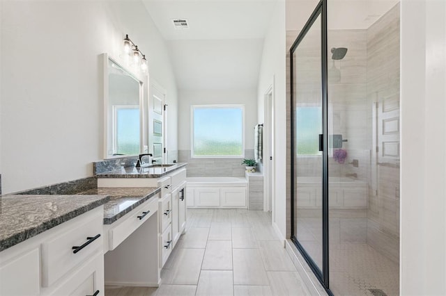 2316 Dixie Dr, Blanchard, OK 73010 - bathroom with a stall shower, vanity, and a garden tub