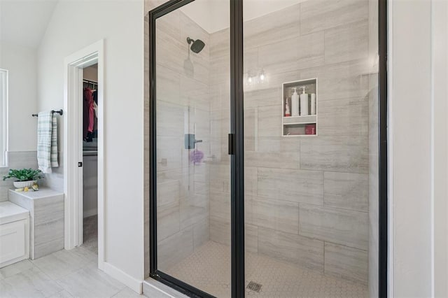 2316 Dixie Dr, Blanchard, OK 73010 - full bathroom featuring a stall shower and a walk in closet