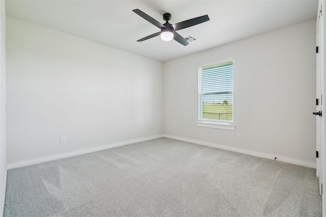 2316 Dixie Dr, Blanchard, OK 73010 - carpeted spare room featuring baseboards and a ceiling fan