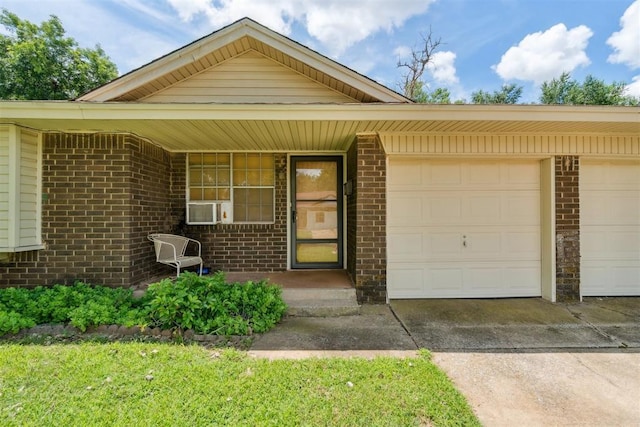 720 NW 16th St, Moore, OK 73160 - view of front of property with a garage, brick siding, and driveway