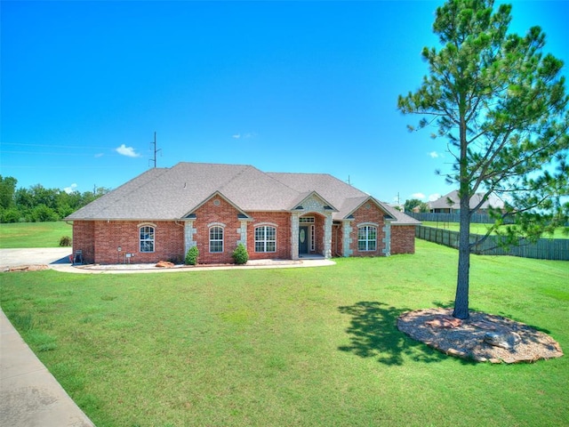 4813 SE 28th St, Oklahoma City, OK 73165 - view of front of property with brick siding and a shingled roof