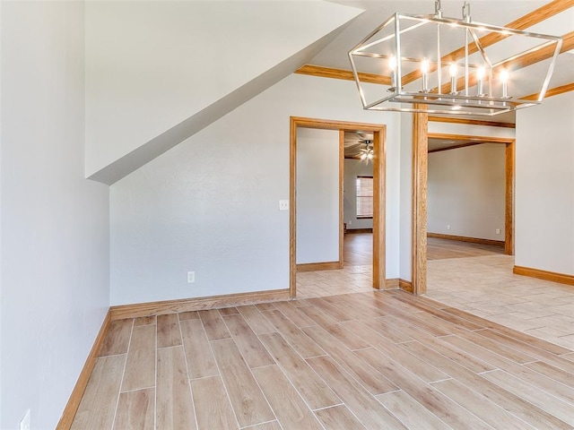 4813 SE 28th St, Oklahoma City, OK 73165 - unfurnished living room featuring wood finished floors and a chandelier