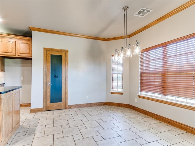 4813 SE 28th St, Oklahoma City, OK 73165 - unfurnished dining area with crown molding and baseboards