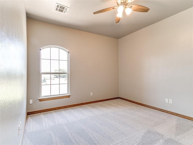 4813 SE 28th St, Oklahoma City, OK 73165 - spare room with light colored carpet and a ceiling fan