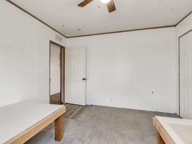 27795 N 2880th Rd, Kingfisher, OK 73750 - unfurnished bedroom with carpet flooring and a ceiling fan