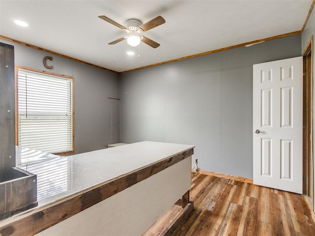 27795 N 2880th Rd, Kingfisher, OK 73750 - unfurnished bedroom with ornamental molding, wood finished floors, recessed lighting, and ceiling fan