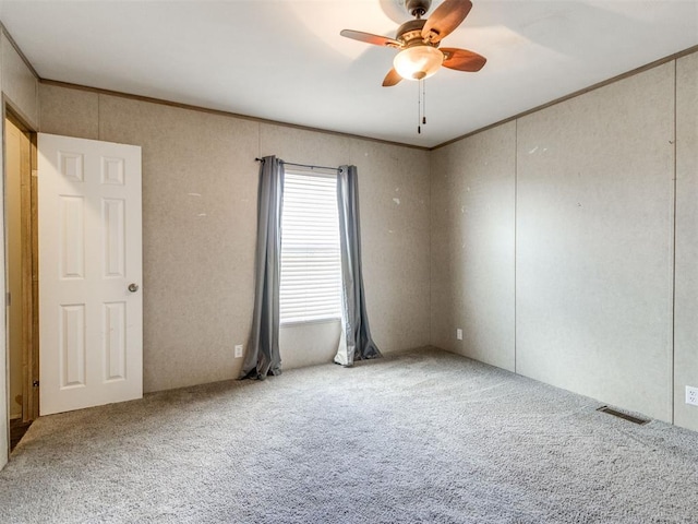 27795 N 2880th Rd, Kingfisher, OK 73750 - carpeted spare room with a ceiling fan and ornamental molding
