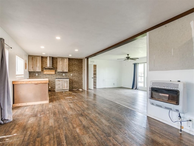 27795 N 2880th Rd, Kingfisher, OK 73750 - kitchen with heating unit, wall chimney range hood, dark wood finished floors, ceiling fan, and recessed lighting