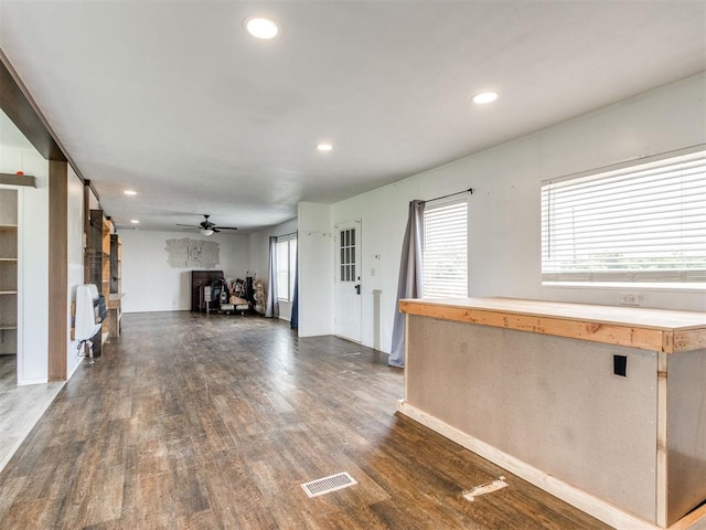 27795 N 2880th Rd, Kingfisher, OK 73750 - unfurnished living room with a ceiling fan, dark wood-type flooring, and recessed lighting