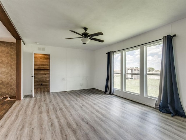 27795 N 2880th Rd, Kingfisher, OK 73750 - unfurnished room featuring wood finished floors and a ceiling fan