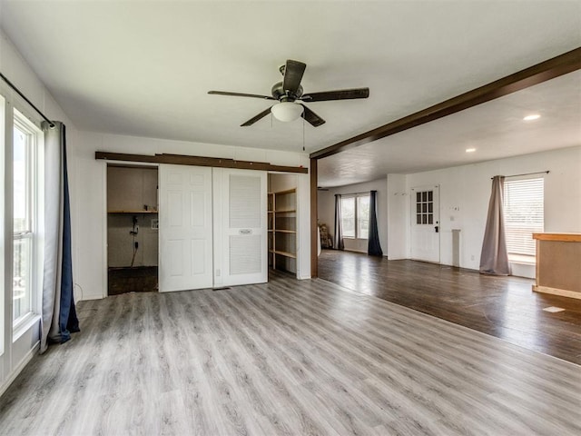 27795 N 2880th Rd, Kingfisher, OK 73750 - unfurnished living room featuring wood finished floors, a ceiling fan, plenty of natural light, and recessed lighting