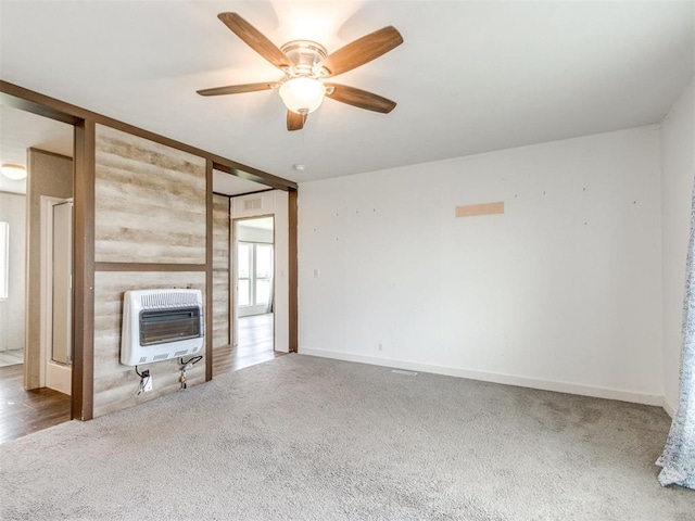 27795 N 2880th Rd, Kingfisher, OK 73750 - unfurnished living room featuring heating unit, ceiling fan, and carpet flooring