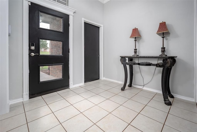 7712 Timber Creek Dr, Choctaw, OK 73020 - foyer entrance featuring light tile patterned floors and baseboards