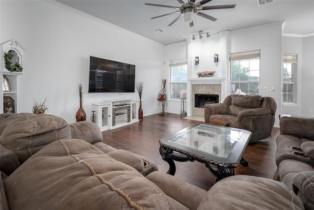 7712 Timber Creek Dr, Choctaw, OK 73020 - living room with a ceiling fan, a tile fireplace, wood finished floors, and crown molding