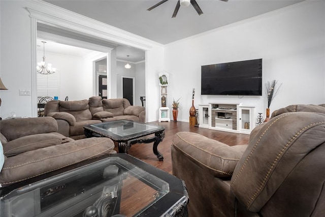 7712 Timber Creek Dr, Choctaw, OK 73020 - living room featuring dark wood-style flooring, ceiling fan, a chandelier, and ornamental molding