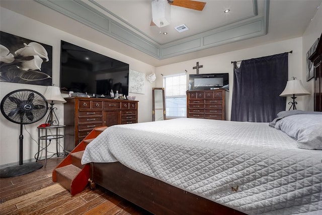 7712 Timber Creek Dr, Choctaw, OK 73020 - bedroom with hardwood / wood-style flooring and ceiling fan