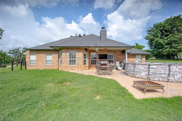 7712 Timber Creek Dr, Choctaw, OK 73020 - rear view of property featuring a chimney, a patio area, brick siding, and roof with shingles