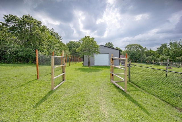 7712 Timber Creek Dr, Choctaw, OK 73020 - view of yard featuring a detached garage and an outdoor structure