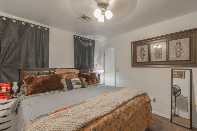 957 N Windermere Dr, Moore, OK 73160 - carpeted bedroom with baseboards and ceiling fan