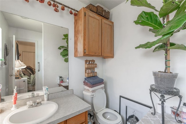 957 N Windermere Dr, Moore, OK 73160 - bathroom with vanity and toilet